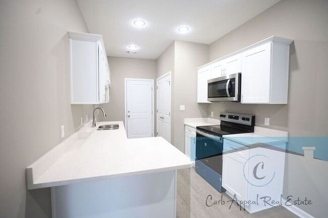 Building Photo - Luxury 2 bed 1 bath apartment - brand new construction!! Washer, dryer and utilities included!!