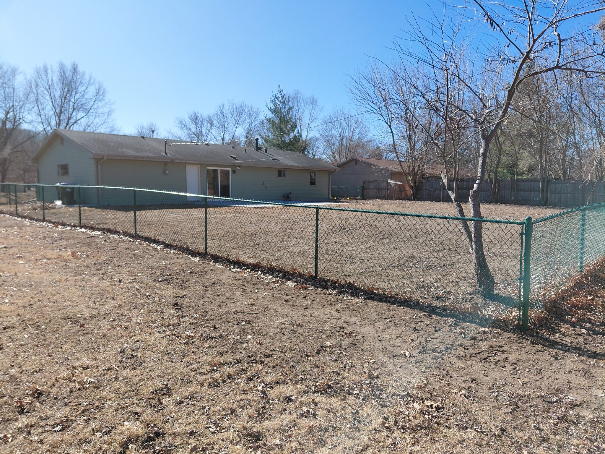 Completely fenced yard - 813 Eastmoor Dr