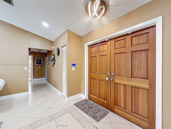 Building Photo - 8060 NW 51st Ct