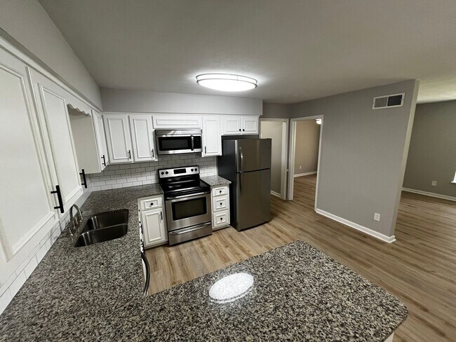 Building Photo - Must See the Sunroom off the Primary Bedroom!