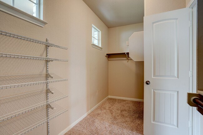 Building Photo - Bright & Roomy 4BR • 2.5BA • Two-Level Living