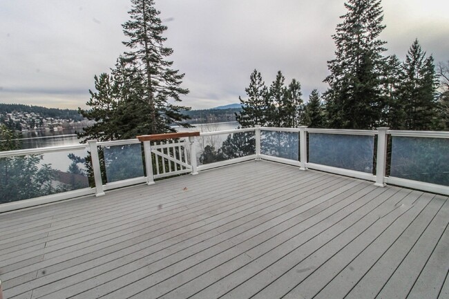 Building Photo - Spacious 4-Bedroom Home with Stunning Lake...