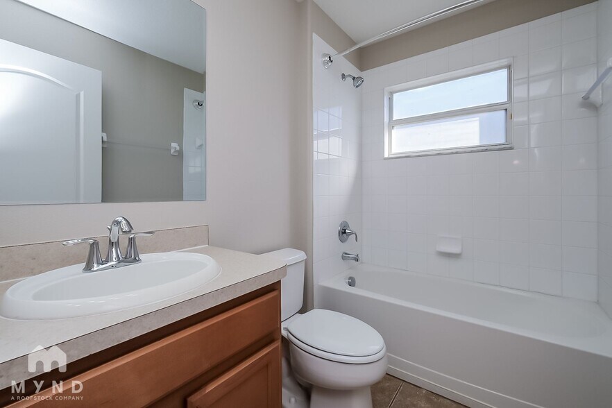 Building Photo - 8133 Alamosa Wood Ave