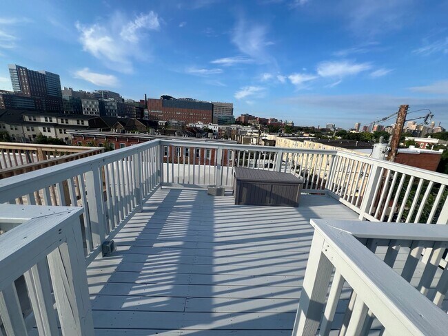 Building Photo - East District 3 BR/3.5 BA End Row Home w-Private Parking