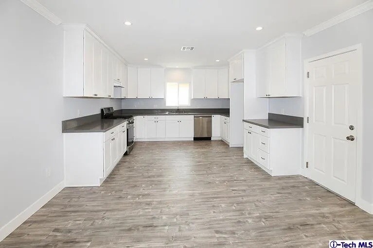 Building Photo - 7435 Collett Ave