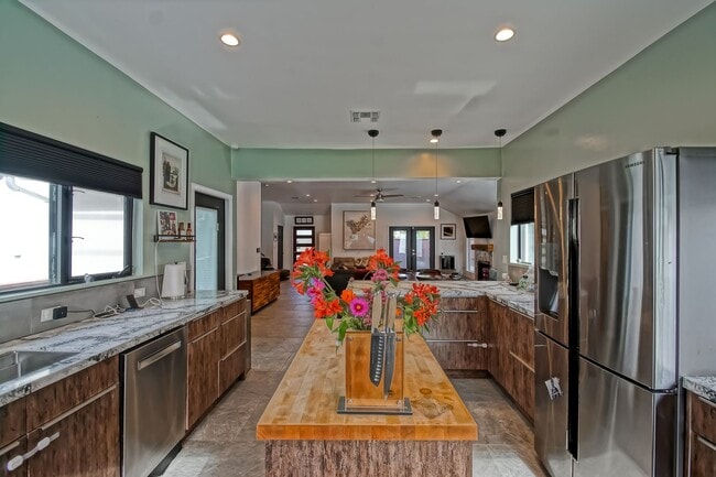 Building Photo - Beautifully Remodeled, Bright & Modern 4BR3BA Home w/ 2BR1BA Guest House On Sprawling Corner Lot ...