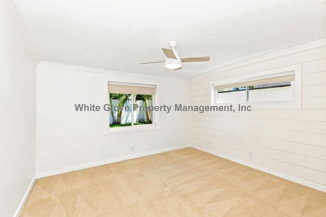 Building Photo - Rare Gated Orange Park Acres 3 Bedroom Property Featuring a Commercial Workshop & Studio