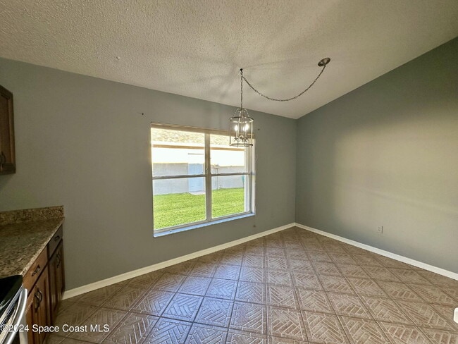 Building Photo - Charming Four Bedroom Home with a Beautiful Pond in the Back