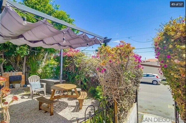 Building Photo - Charming, Fully Furnished Spanish-Style Du...