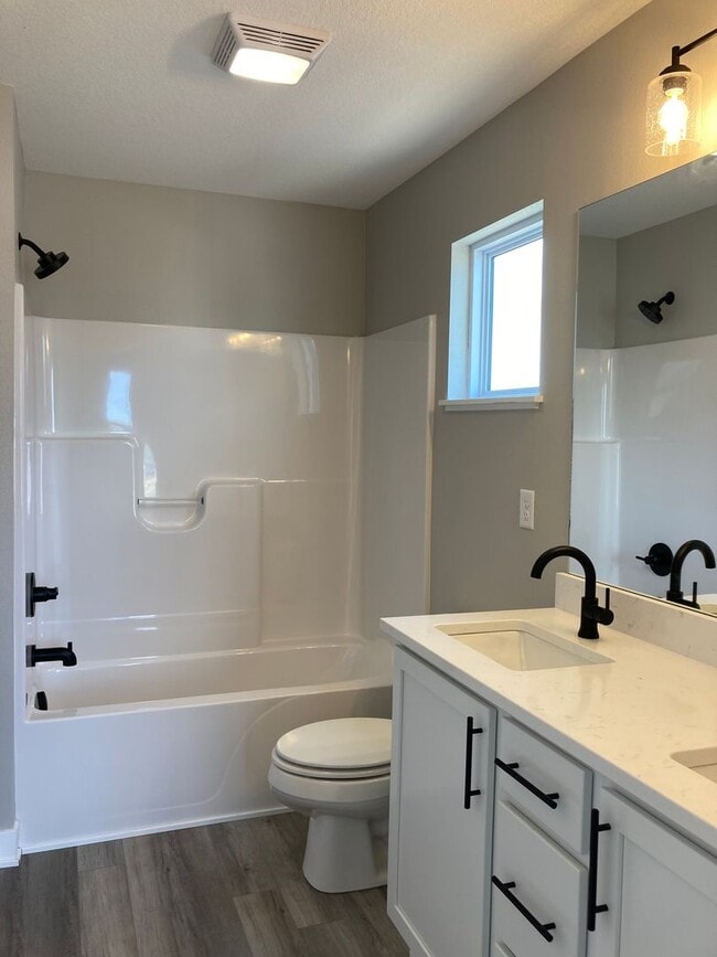 Building Photo - Spacious 4-Bedroom Home with 2-Car Garage & Yard