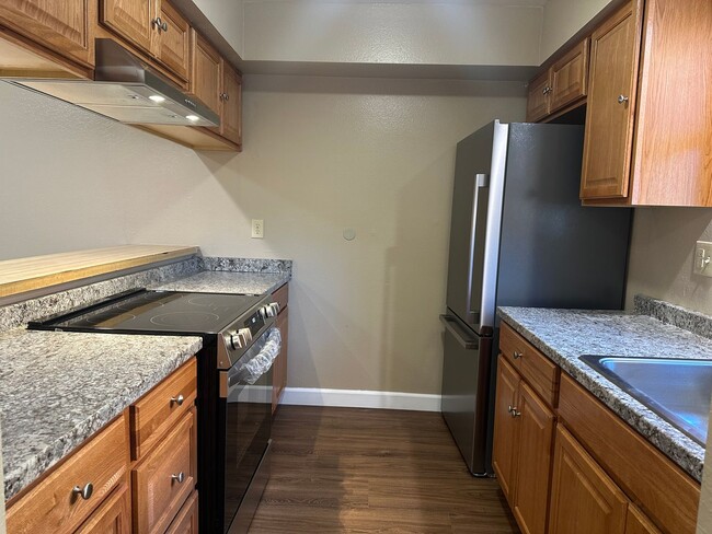 Building Photo - 2+1.5 REMODELED BRAND NEW APPLIANCES INCLUDED