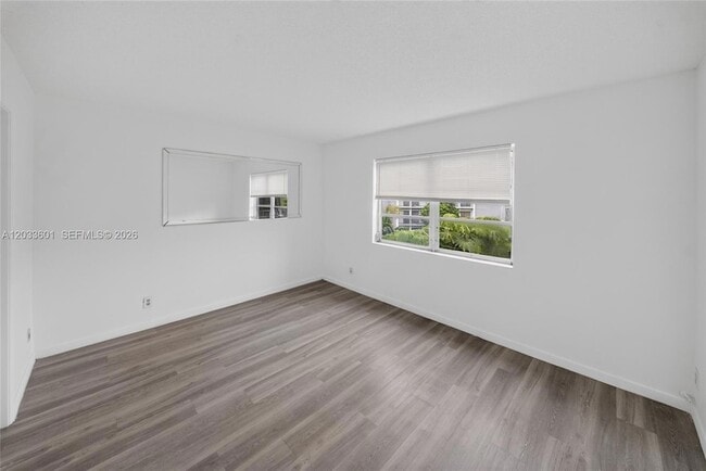 Building Photo - 8750 N Sherman Cir