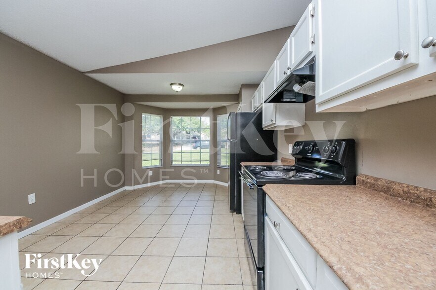 Building Photo - 7560 Groveoak Dr