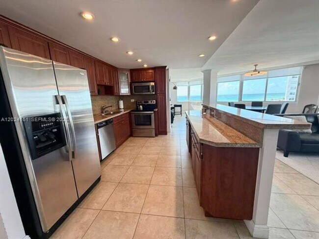 Building Photo - 7135 Collins Ave