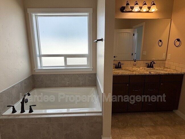Building Photo - 9070 W Songwood Dr