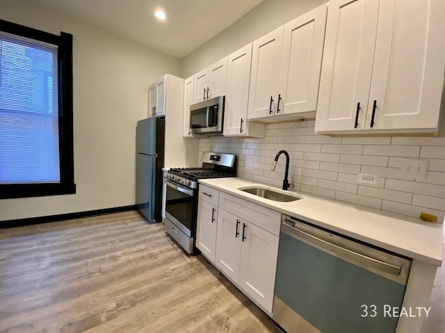 Building Photo - Beautifully Rehabbed 2 Bedroom 1.5 Bath in...