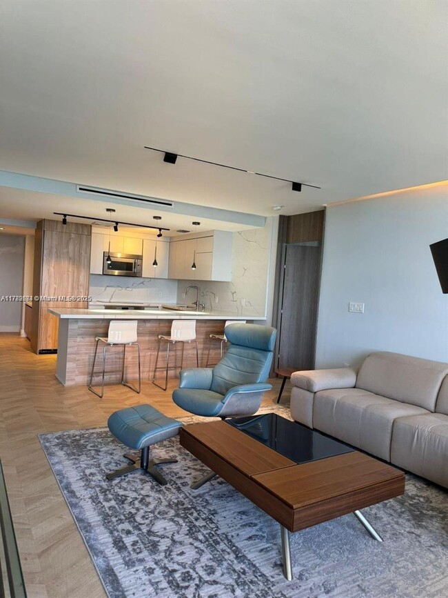 Building Photo - 10185 Collins Ave
