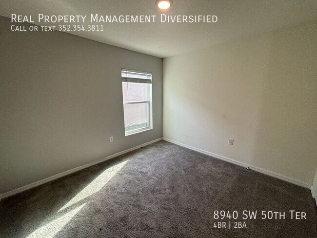 Building Photo - 8940 SW 50th Ter