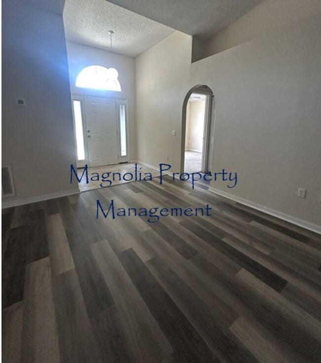 Building Photo - New Paint, Floors and Solid Surface Counte...