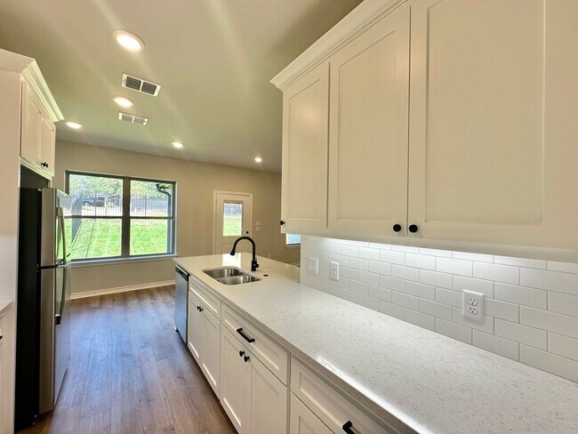 Building Photo - Tour Today! New Construction 4 Bed 2 Bath Triplex!