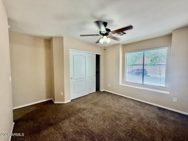 Building Photo - 9323 W Harmony Ln