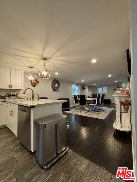 Building Photo - 10824 Paso Robles Ave