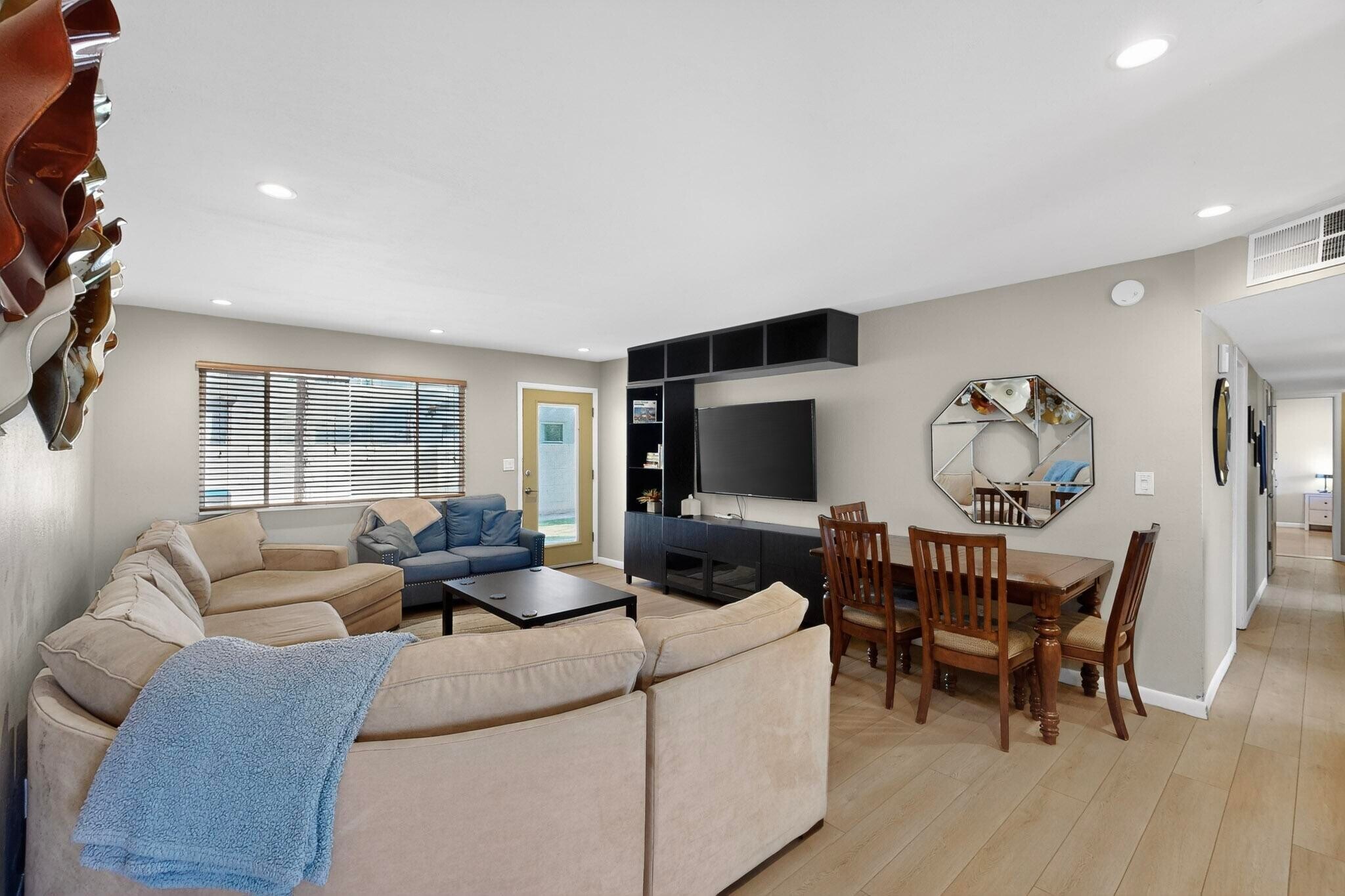 comfortable living room with SmartTV - 4715 Marquette Ave NE