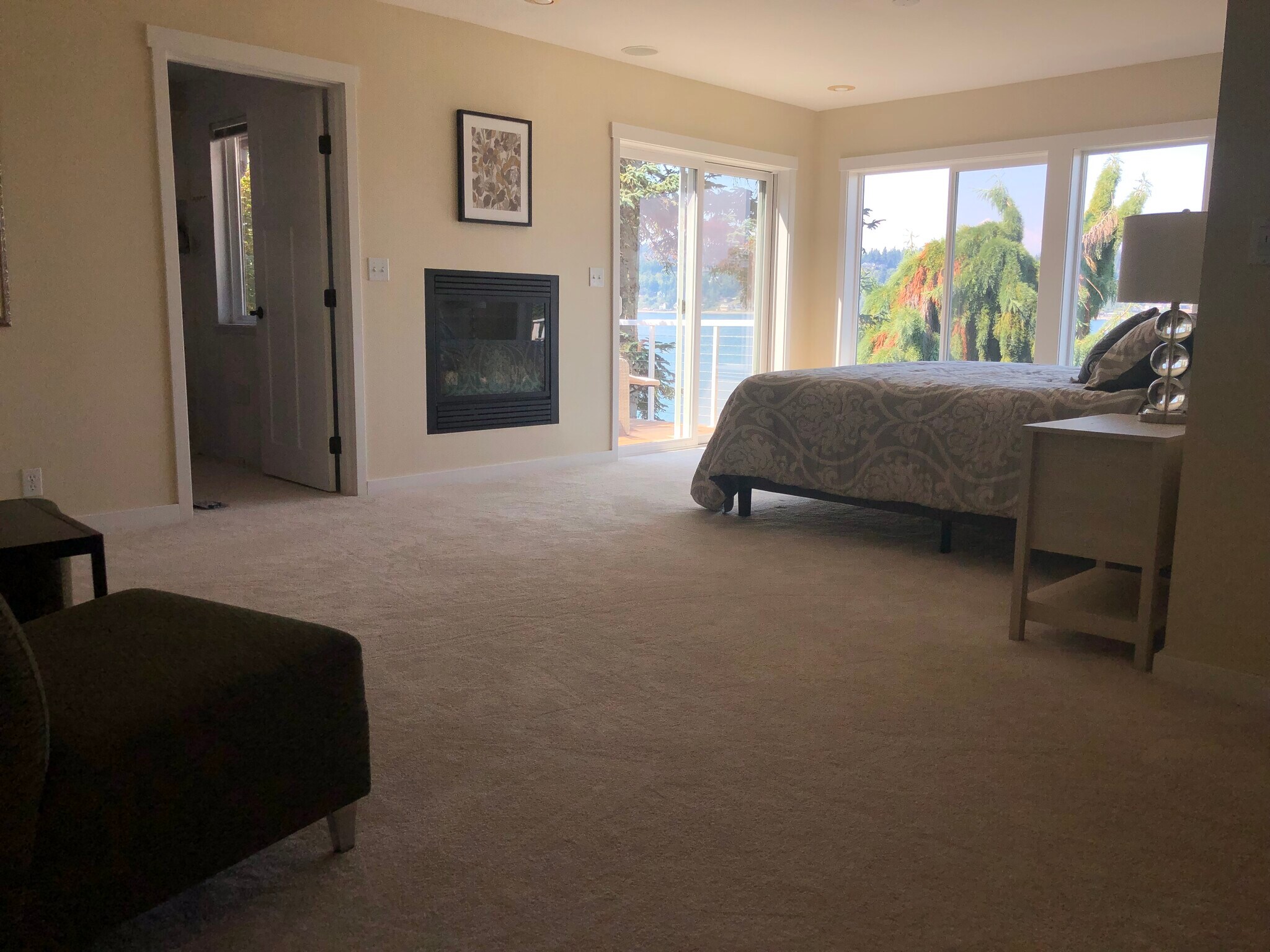 Main bedroom with gas fireplace & private deck - 7107 120th St NW
