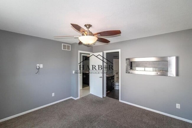 Building Photo - Updated 4 Bedroom Home with Remodeled Kitchen & Tiered Deck