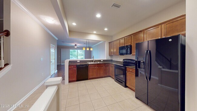 Building Photo - 6937 Woody Vine Dr