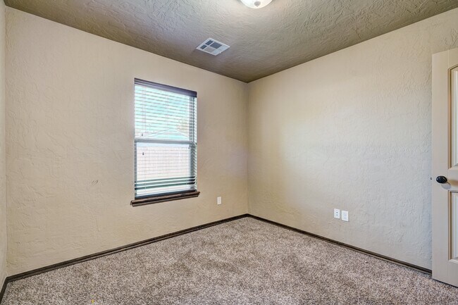 Building Photo - AVAILABLE THE END OF APRIL! 3 OR 4 BDRM, 2 BATHRM, 2 CAR & STORM SHELTER