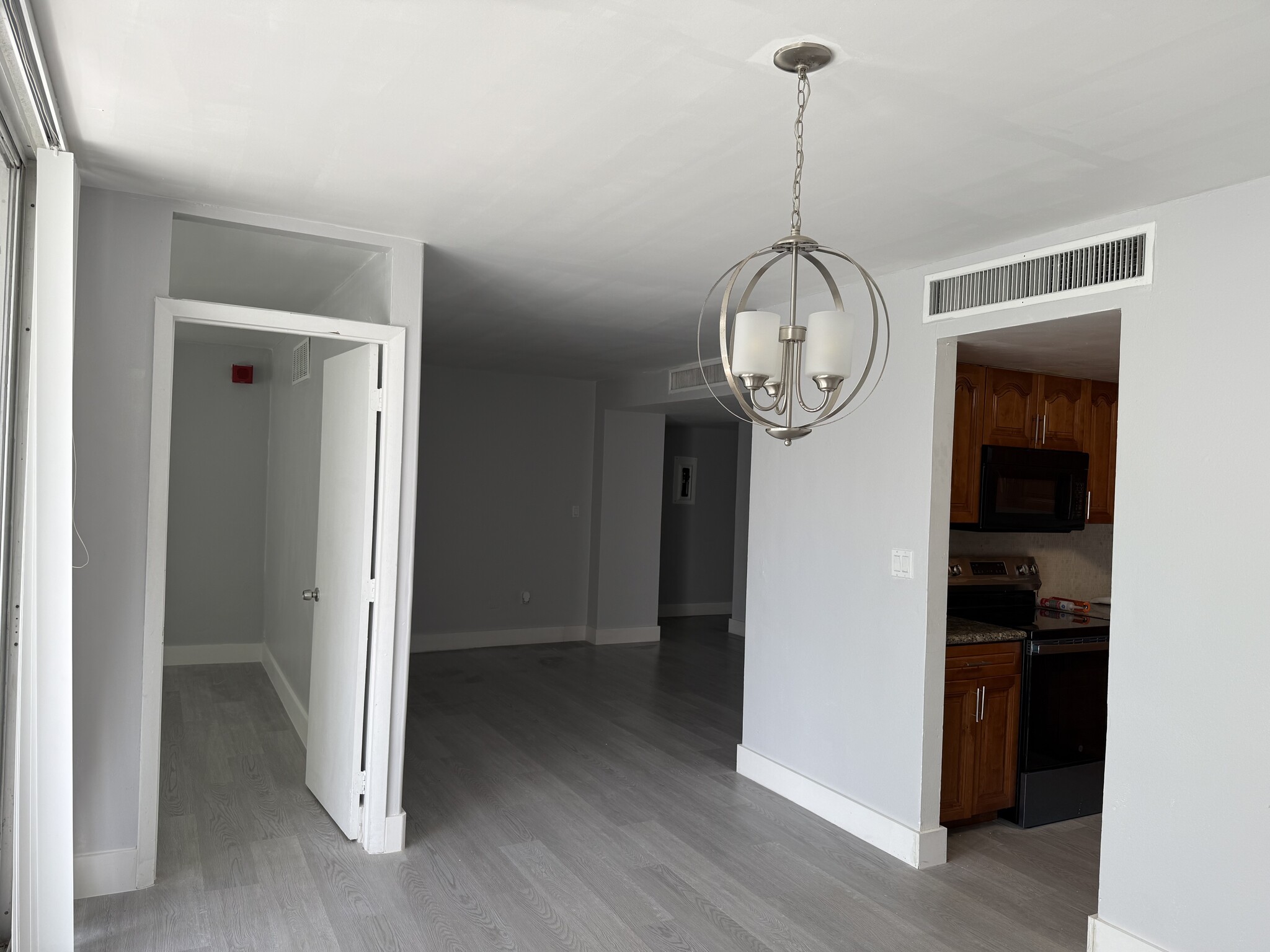 View of dinning and living room - 1865 79th Street Cswy
