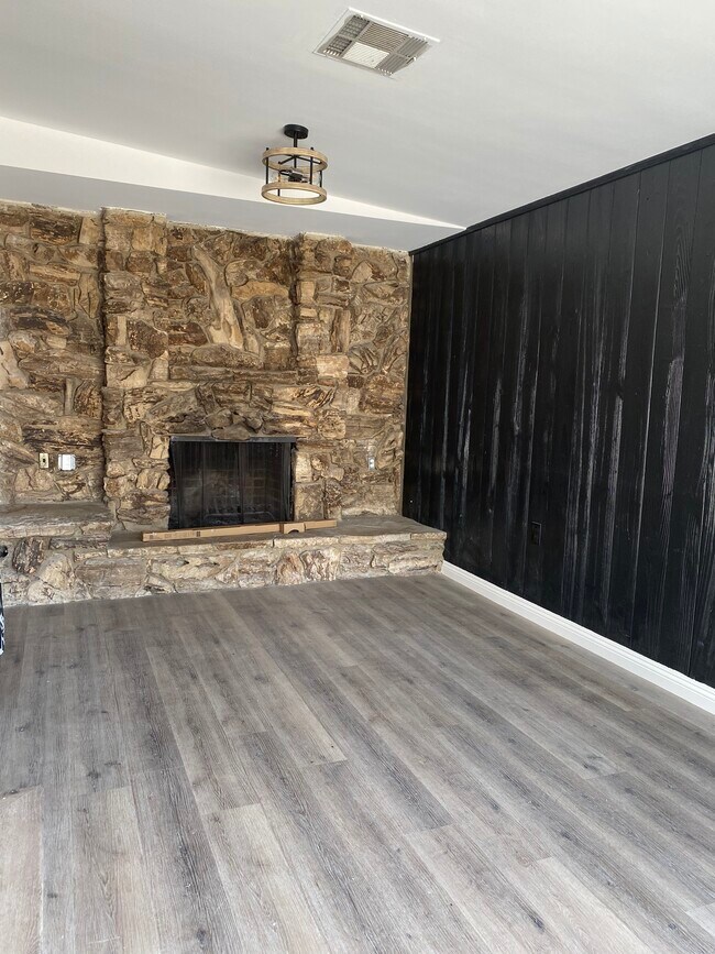 Stone Fireplace leading out to garden - 17423 Burbank Blvd
