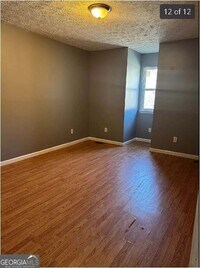 Building Photo - 6465 River Park Dr