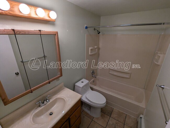 Building Photo - Beautifully Maintained Brick Duplex