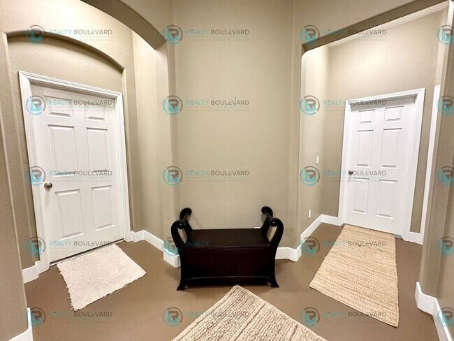 Building Photo - Open Kitchen, Expansive Living, and Covered Patio in Tranquil South Reno Near Trails, Parks & Sho...