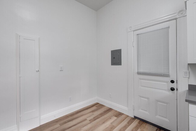 Building Photo - Remodeled pet friendly, top floor 2BR with in-unit laundry