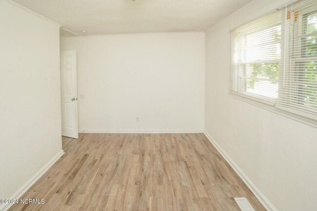 Building Photo - Lawn Care Included in Jville City Limits!