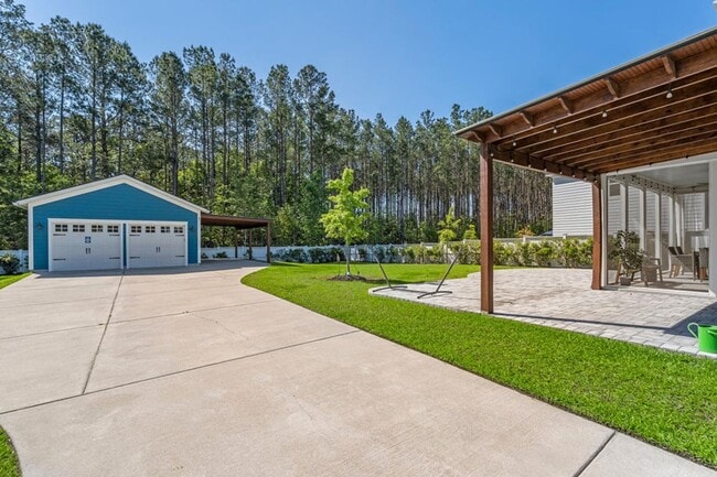 Building Photo - Better than new 4 bedroom + office on larg...