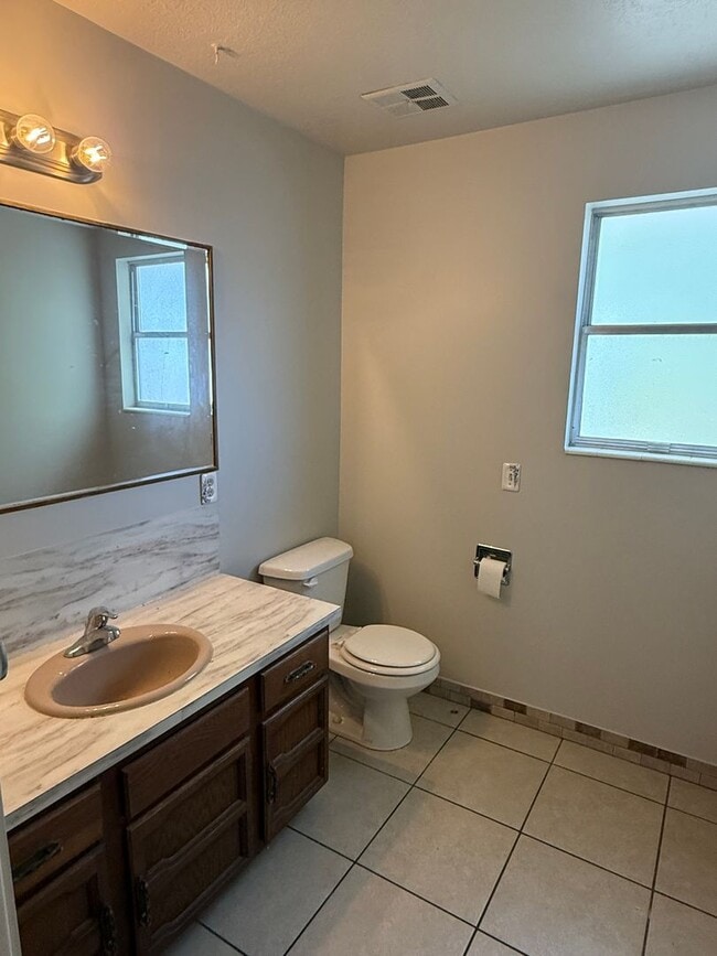 Building Photo - Great home with 2 car garage, deck and shed, fenced yard in Roy for rent