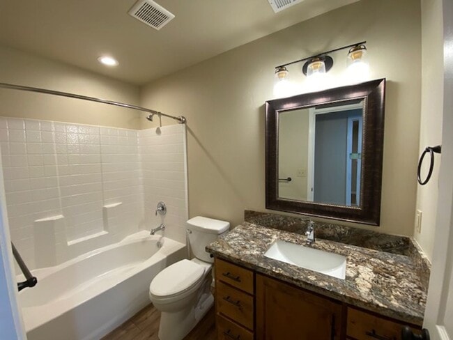 Building Photo - Simply gorgeous 3/2 with 2 car garage, dog...