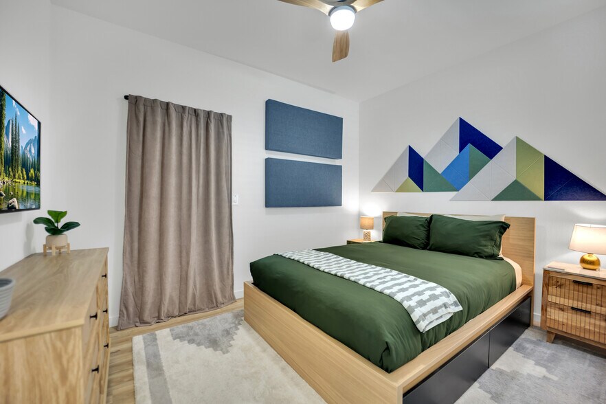 Queen bed with 4 storage drawers and 40” Roku tv - 9440 Sequoia Ridge Ave