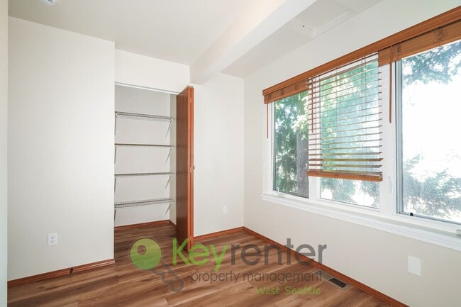 Building Photo - Bright 2-Bedroom with Garage, Storage, and...
