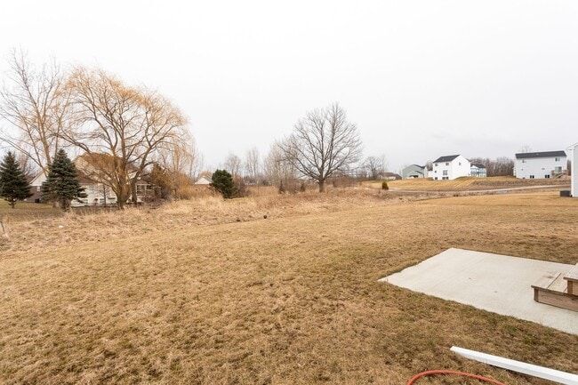 Building Photo - COMING SOON! Spacious 4-Bed Grand Blanc Home with Modern Comfort