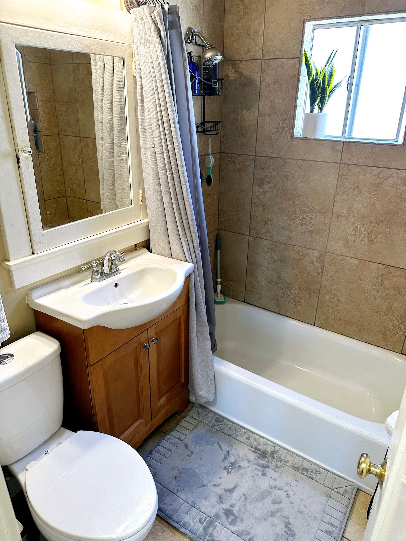 travertine bathroom - 259 Euclid Ave