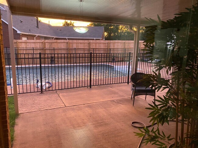 Building Photo - Home with Pool!