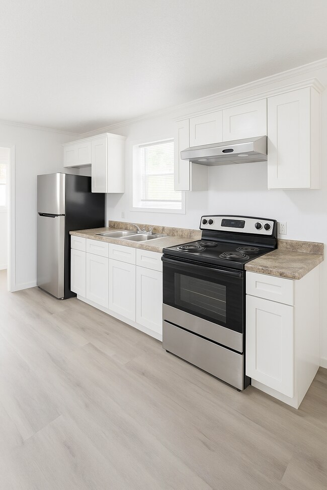 Building Photo - 610 E Ave E