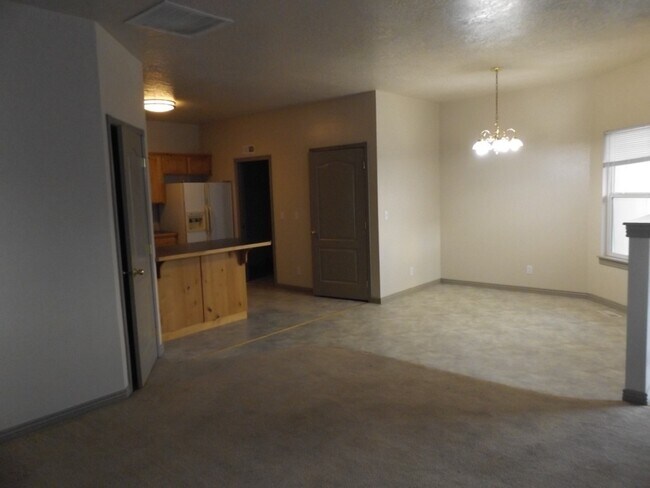 Building Photo - Spacious 3 Bedroom, 2 Bathroom Duplex with Two Car Garage and Fenced Yard!