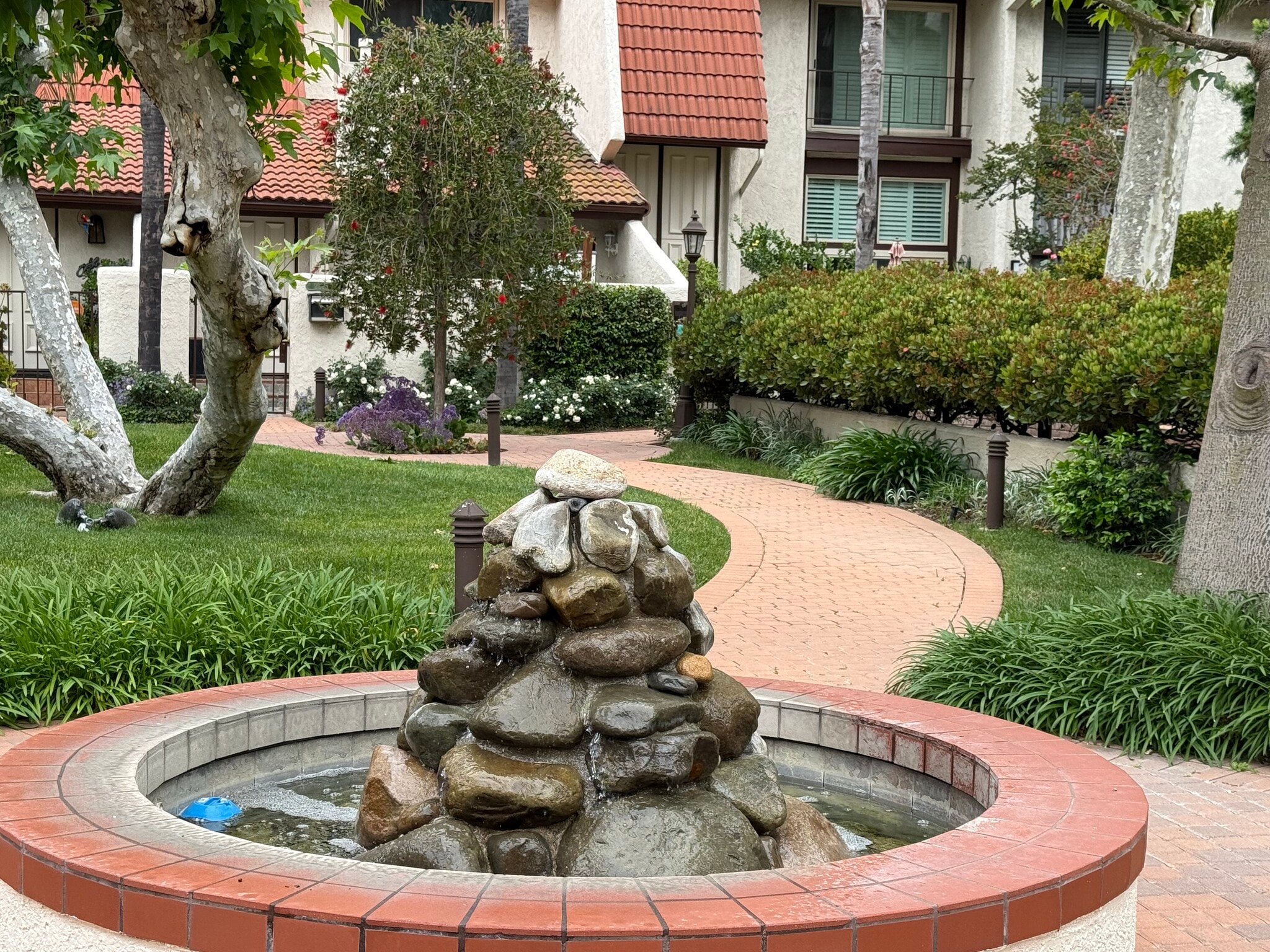 2 water features for relaxing by the pool. - 22271 Erwin St