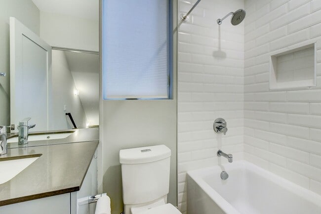 Building Photo - Smart Layout, Prime Location, and a Rooftop That Seals the Deal